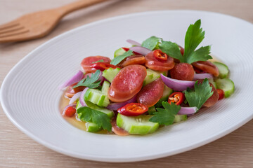 Wall Mural - Spicy chinese pork sausage salad on plate, Thai food