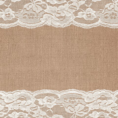 Off-White Lace on Brown Burlap Texture