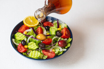 Mediterranean salad. It contains plenty of olive oil and vinegar water. It's a great salad for dieters. A widely consumed salad for a healthy diet.