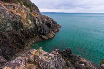 Wall Mural - Colorful water seen of coast of Fidalgo Island, Washington, United States