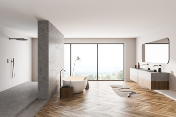 Bathroom interior with bathtub, sinks and shower with window on countryside