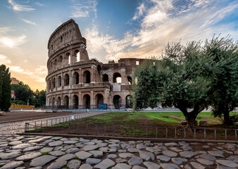 Poster - Colosseum in Rome (Roma), Italy. The most famous Italian sightseeing on blue sky