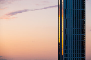 Skyscraper on a sunset sky