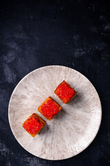 Canvas Print - toasts with red caviar, foie gras ganache and fried brioche with red caviar