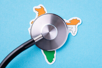 Wall Mural - Health state of Indian citizens. Stethoscope head pulled to the map of India