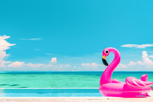 Travel Vacation Pool Beach Travel Concept With Inflatable Pink Flamingo Float Toy Mattress In Luxury Swimming Pool. Luxury Lifestyle Summer Holidays Travel Background