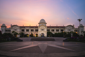 facade of ipoh railway station at dusk in ipoh city, malaysia