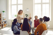 © Studio Romantic - Getting psychological help in a friendly atmosphere. Professional female psychologist listens and gives advice to people at a support group meeting. People sit in a circle and share their stories.