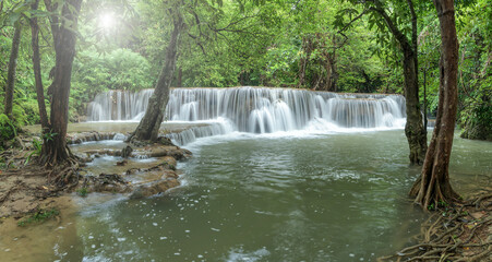 Aufkleber - Panoramic beautiful deep forest waterfall in Thailand.