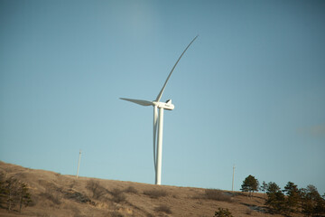 An electric wind turbine in field