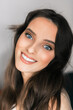 © Myroslava - Portrait of a smiling young brunette woman, model, enchanted look, looking at the camera.