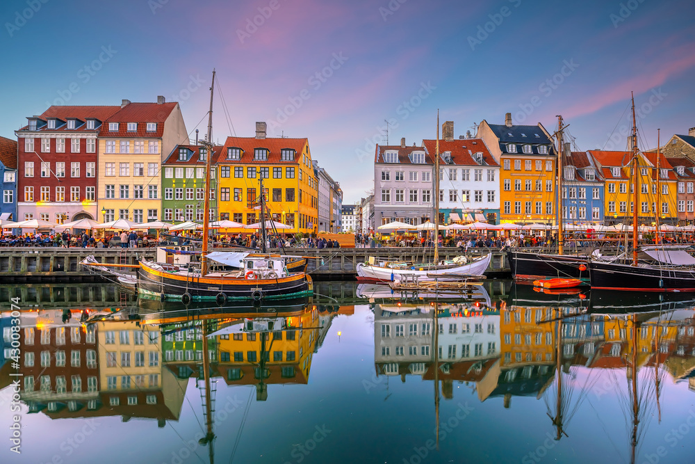 Copenhagen city skyline in Denmark at famous old Nyhavn port - obrazy, fototapety, plakaty 