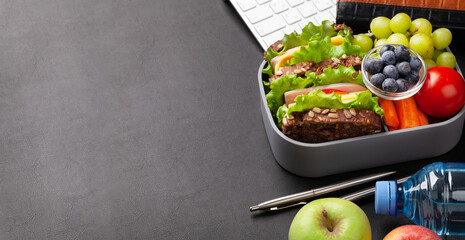 Wall Mural - Healthy office lunch box with sandwich and fresh vegetables