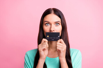 Poster - Photo of young attractive lovely pretty voiceless girl cover mouth with credit card isolated on pink color background