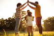 © liderina - African American family having fun outdoors.