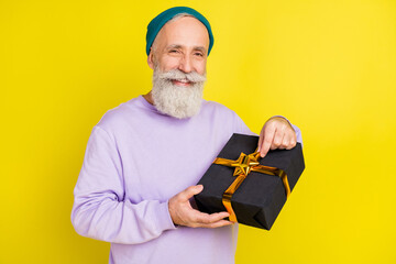 Sticker - Photo of attractive sweet age gentleman wear violet sweater headwear smiling opening present isolated yellow color background