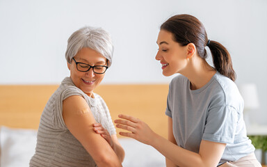 Wall Mural - Senior woman after vaccination.