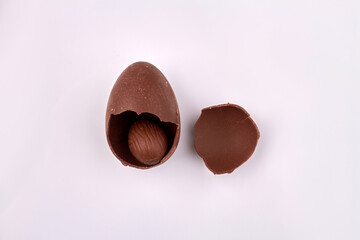 Chocolate eggs on white background.