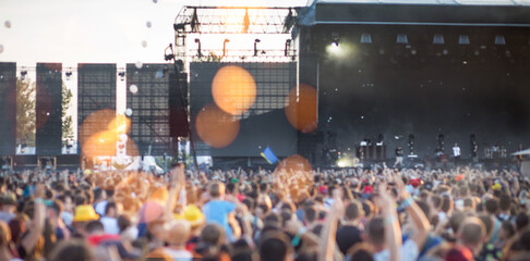 Summer music festival concert crowd