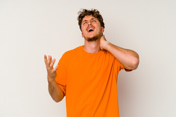 Wall Mural - Young caucasian man isolated on white background screaming with rage.