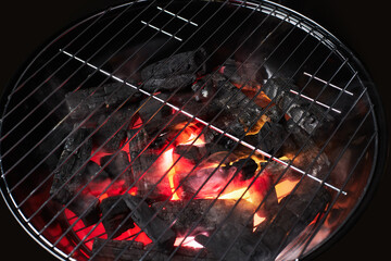 Empty grill with red fire