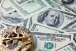 © Aguus - Finance world navigation concept - compass on the US$100 bill background