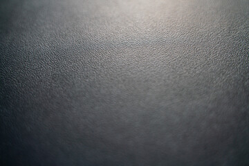 Wall Mural - Genuine black cow fullgrain leather selective focus