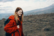 © SHOTPRIME STUDIO - beautiful traveler with a backpack are resting in the mountains on nature landscape autumn