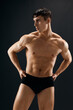 © SHOTPRIME STUDIO - male athlete dark coward muscled body studio dark background