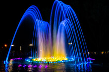Colored Water Fountain At Night