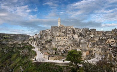 Wall Mural - Matera, Basilicata, Puglia, Italy - City view of old town and duomo cathedral - Sassi di Matera in the region of Basilicata. European Capital of Culture for 2019