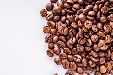 aromatic fresh coffee beans on a white acrylic background