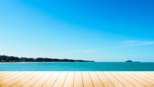 Empty Wood Deck Pier With Sea Ocean View Background Calm And Tranquil