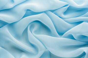 Wall Mural - light blue fabric draped with large folds, delicate textile background