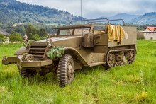 The M5 Half-track (officially The Carrier, Personnel, Half-track, M5)  American Armored Personnel Carrier In Use During World War II. Reconnaissance And Transport Vehicle