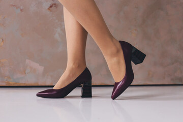 Beautiful legs woman wearing low heels shoes.