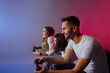 © oksix - Group of friends together start virtual game