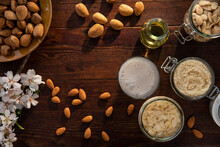 Spain, Baleares, Almonds and almond products on wooden table