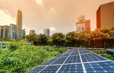 Wall Mural - ecological energy renewable solar panel plant with urban landscape landmarks