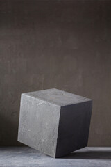 Sticker - Concrete cube near wall background texture. Art or construction concept of minimalism design