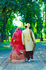 Indian groom and bridal enjoying nature