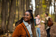 © Zoran Zeremski - Three female friends having fun and enjoying hiking in forest.