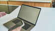 © Epic_pic - Mockup image of a man working at the laptop and smartphone