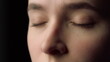 © stockbusters - Macro of female face beauty resting with closed eyes in black studio.Tired woman
