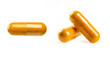  Close up Turmeric capsules isolated on white background.