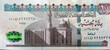 The obverse side of 100 Egyptian pounds banknote year 2021, obverse side has an image of Sultan Hassan Mosque Cairo, Egypt. A large fragment of the side