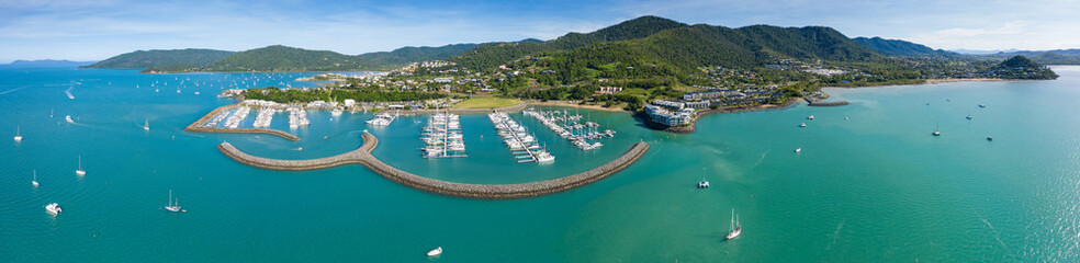 Wall Mural - Aerial panoramic view of the marina at beautiful Airlie Beach in Queensland Australia