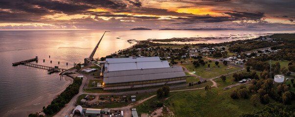 Sunrise view of the famous 6km long sugar cane jetty at Lucinda in Far North Queensland, Australia