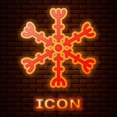 Sticker - Glowing neon Snowflake icon isolated on brick wall background. Vector Illustration