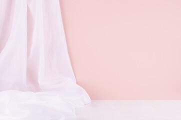 Abstract modern minimal scene or interior with soft light pastel pink wall, white silk curtain and white wood table of floor. Background for display, presentation, showing.